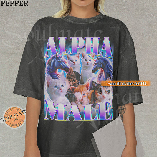 Collage of several cute kittens and two unicorns surrounded by blue lightning with bold purple and blue text reading Alpha Male on a washed pepper shirt.
