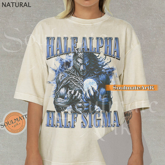 Graphic of a dual-toned werewolf holding a moon with electric blue energy and bold text reading HALF ALPHA HALF SIGMA on a natural shirt.