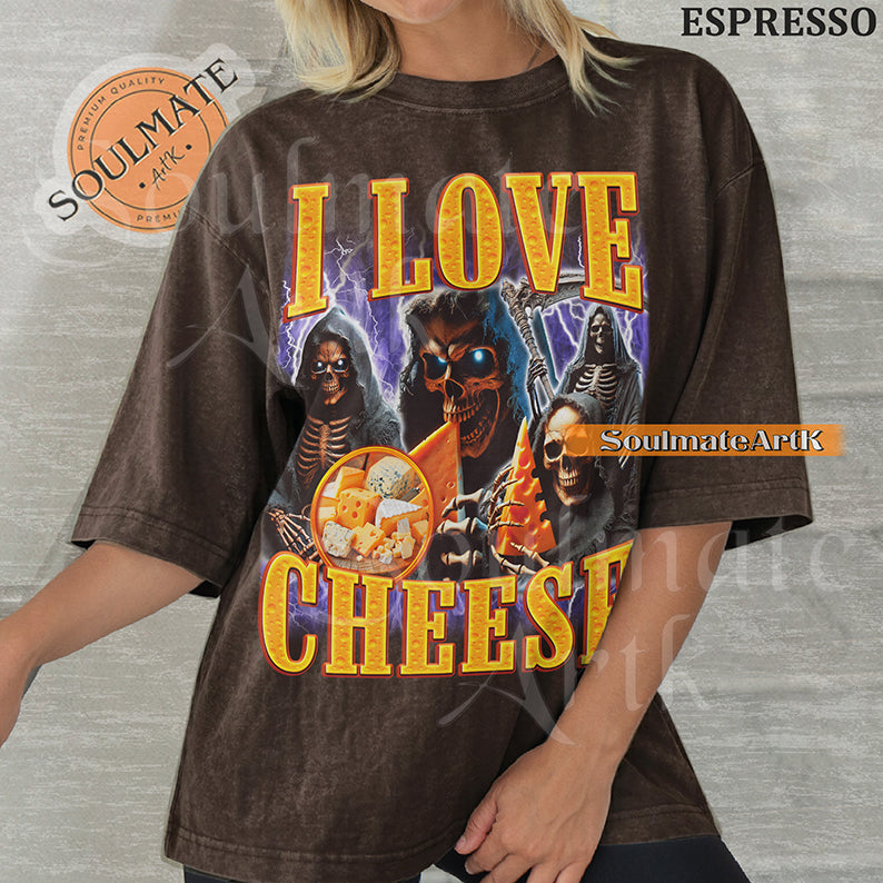 Vintage-style bootleg graphic of a skeleton excitedly holding a large wedge of cheese with the text I Love Cheese in a bold 90s metallic font on a washed t-shirt.