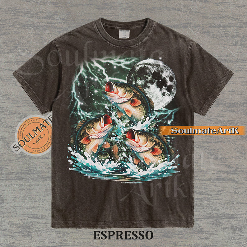 Collage of three bass fish jumping out of water in front of a glowing moon and lightning on a washed espresso shirt.