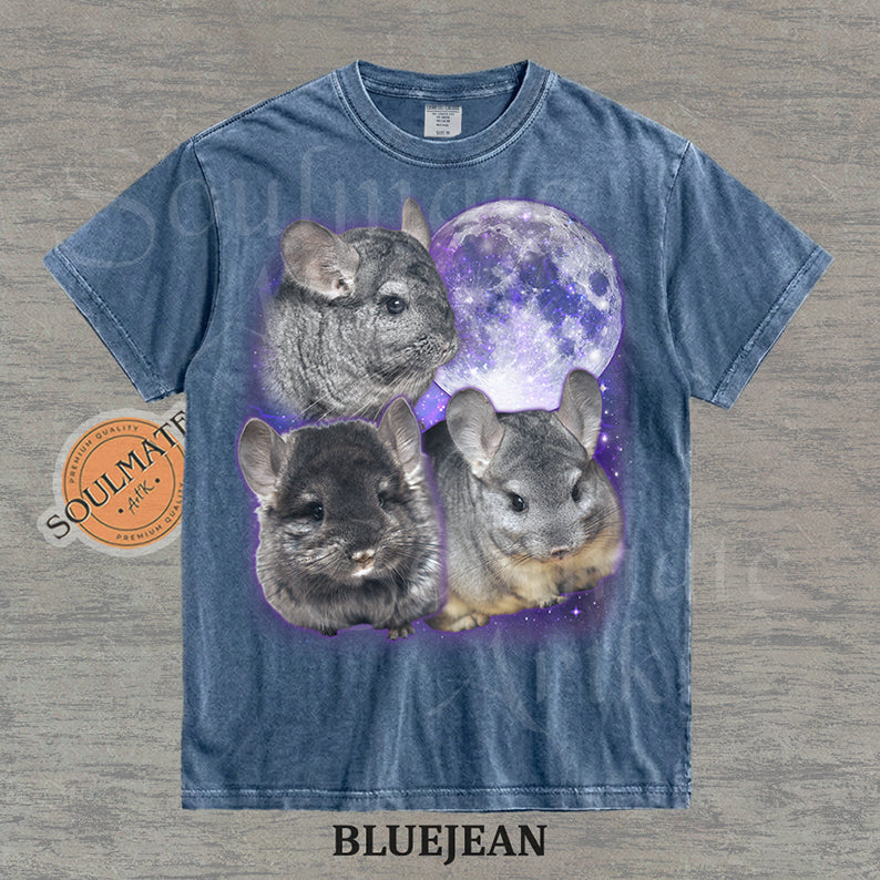 Collage of three grey chinchillas in front of a glowing purple moon and stars on a washed bluejean shirt.
