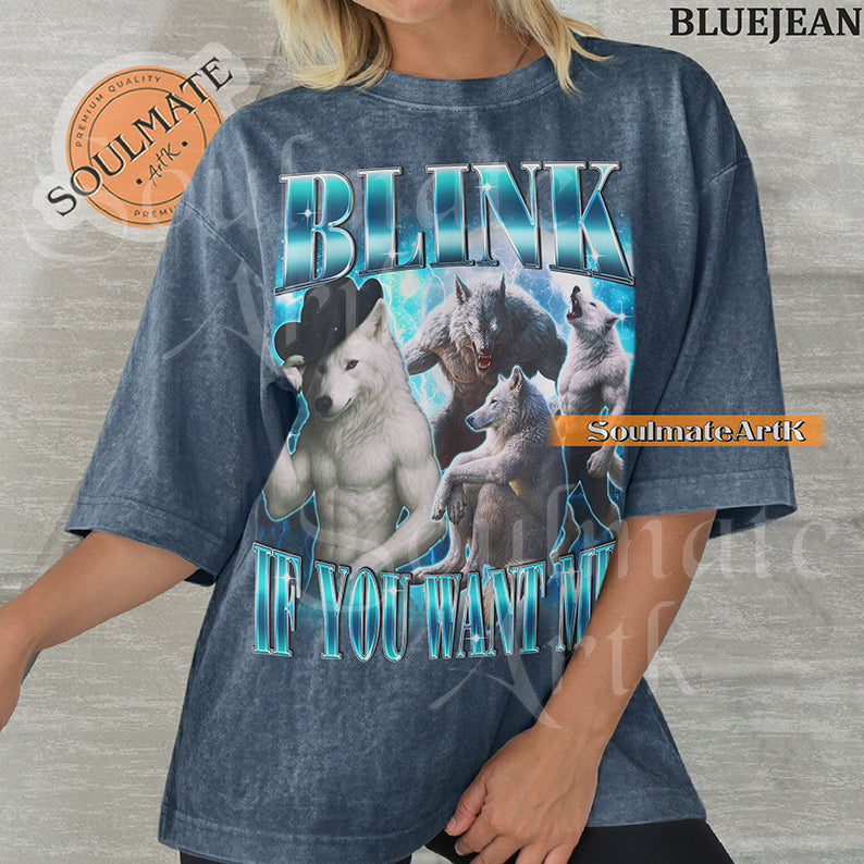 Graphic collage of muscular wolves and a cowboy wolf surrounded by blue lightning with bold blue text on a washed bluejean shirt.