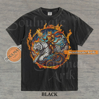 Illustration of an armored cat warrior riding a white tiger over a dragon, surrounded by a circle of fire on a washed black shirt.