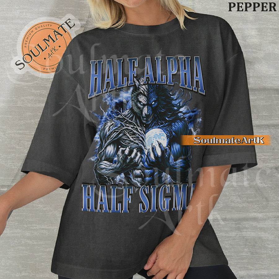 Graphic of a dual-toned werewolf holding a moon with electric blue energy and bold text reading HALF ALPHA HALF SIGMA on a washed pepper shirt.