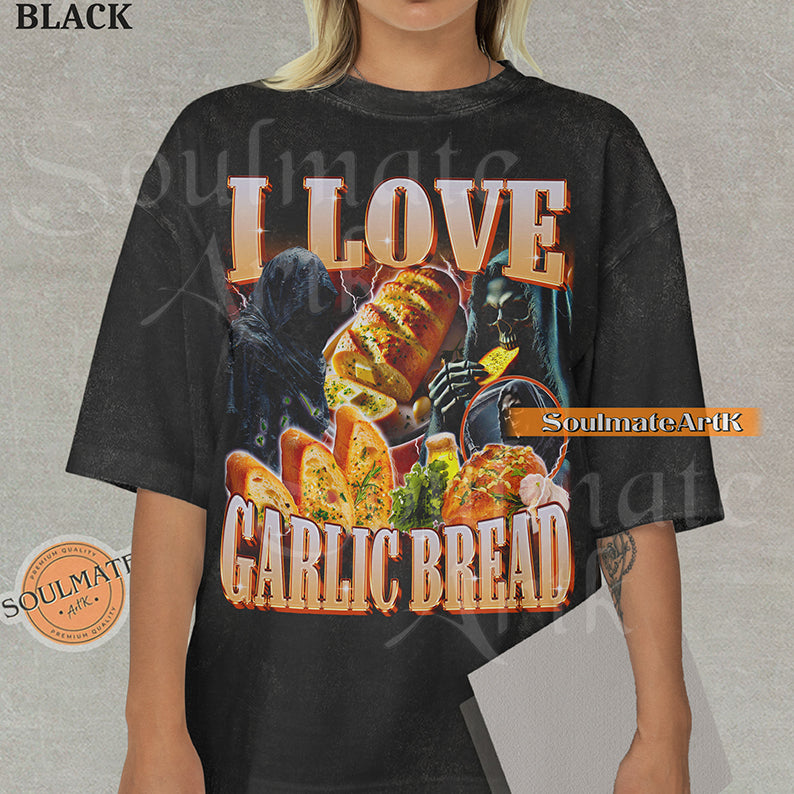 Graphic collage of hooded skeletons and reapers with golden garlic bread and lightning with bold text reading I LOVE GARLIC BREAD on a washed black shirt.