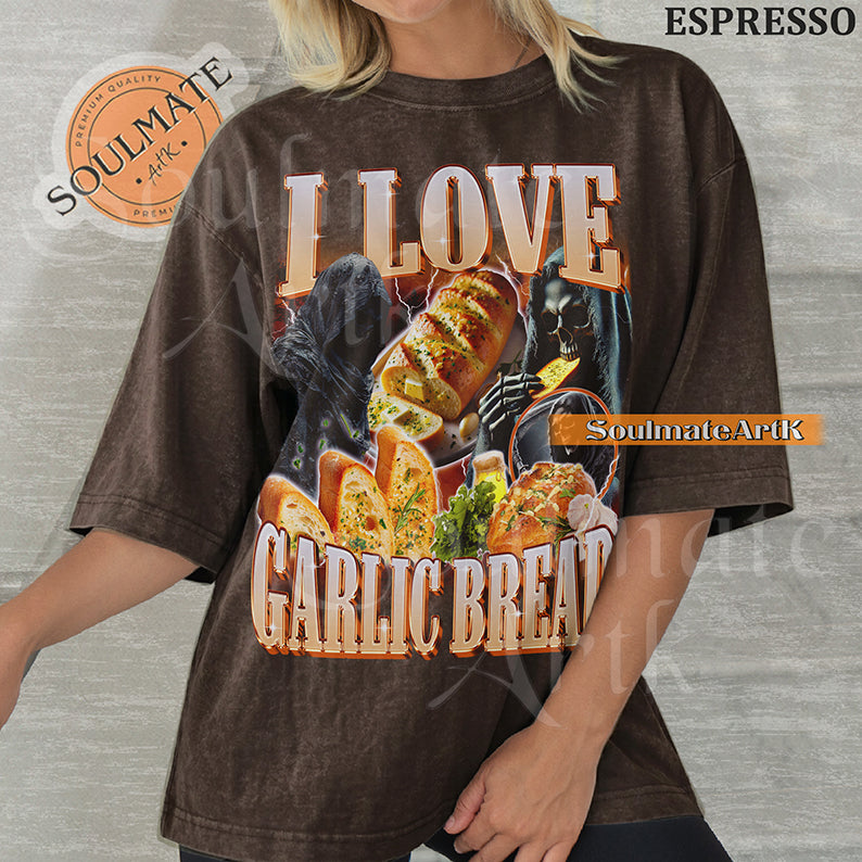 Graphic collage of hooded skeletons and reapers with golden garlic bread and lightning with bold text reading I LOVE GARLIC BREAD on a washed espresso shirt.