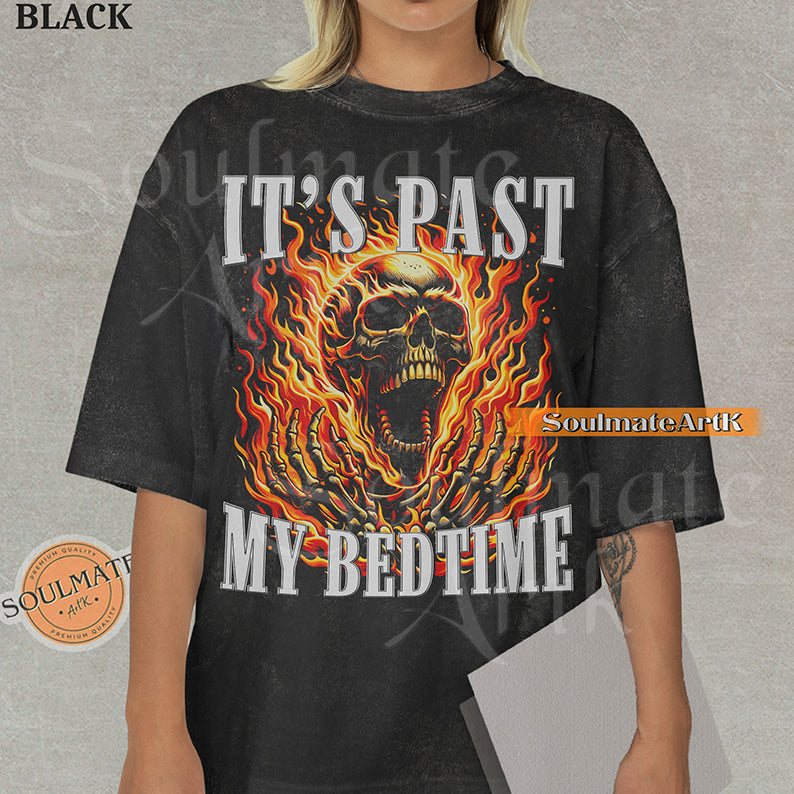 Graphic of a screaming skull in orange flames with bold text reading IT'S PAST MY BEDTIME on a washed black t-shirt.