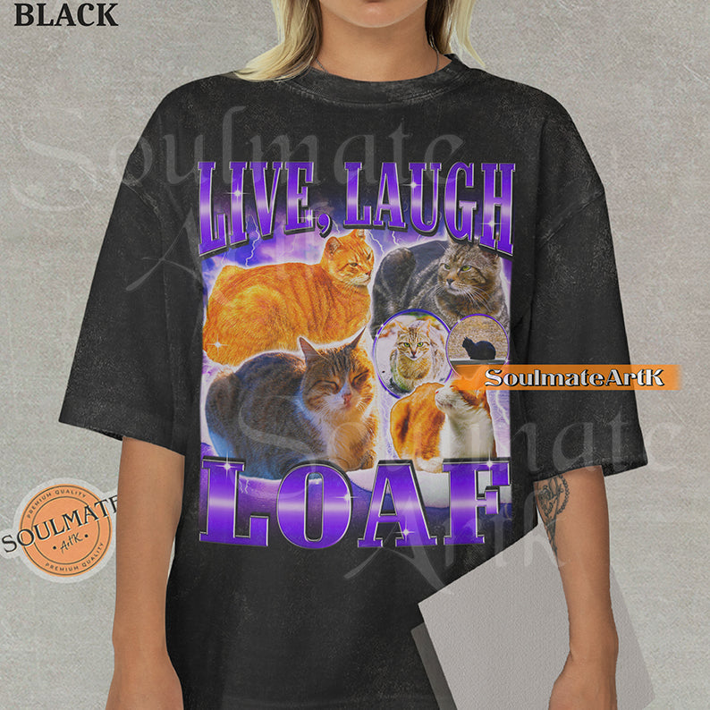 Collage of several cats sitting in loaf positions surrounded by purple lightning with bold purple text reading Live Laugh Loaf on a black shirt.
