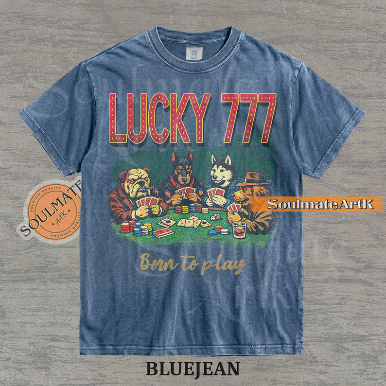 Retro-style illustration of four dogs playing poker under bold "LUCKY 777" text on a washed bluejean shirt.