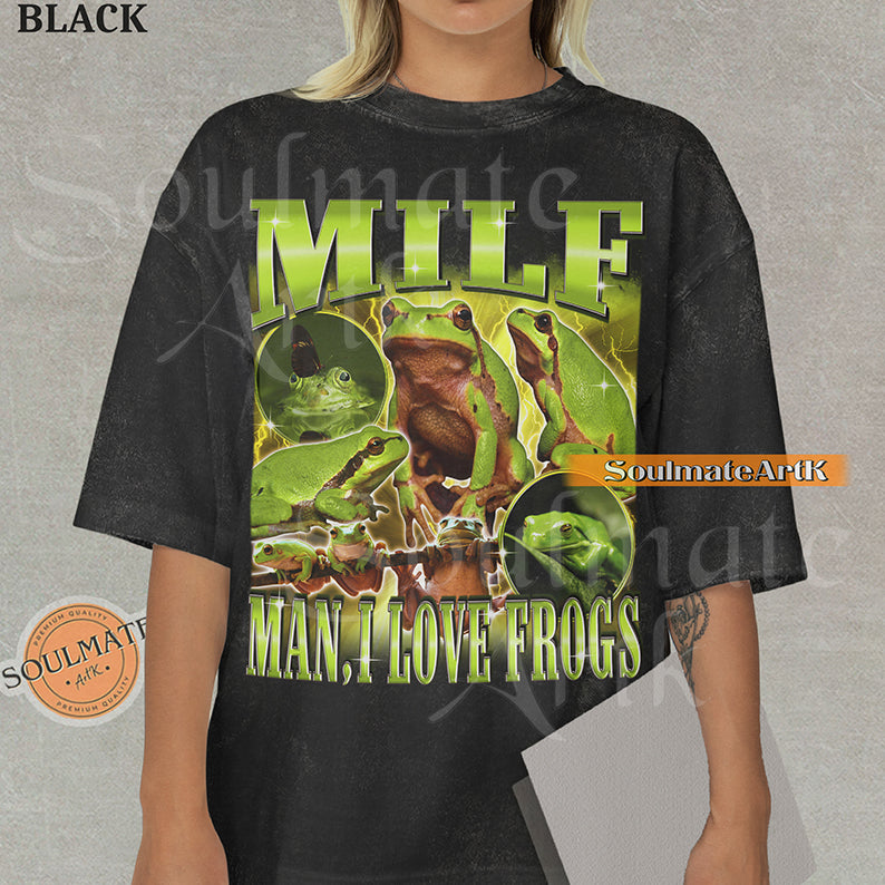 Vintage-style collage of green frogs with lightning effects and bold metallic text reading MILF Man I Love Frogs on a washed black t-shirt.