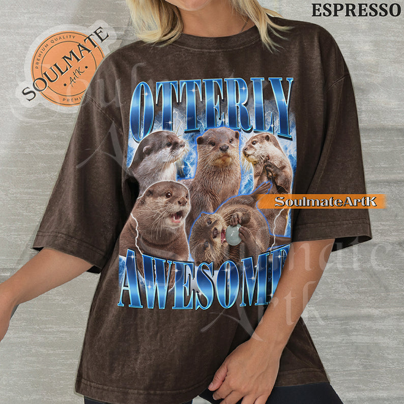 Collage of multiple otters in various poses surrounded by blue lightning with bold blue text reading Otterly Awesome on a espresso shirt.