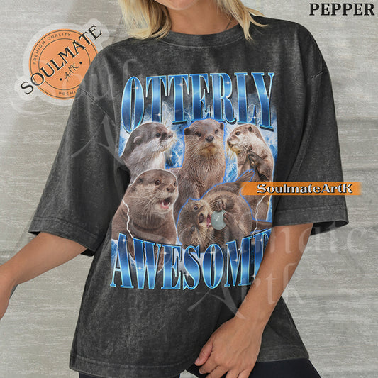 Collage of multiple otters in various poses surrounded by blue lightning with bold blue text reading Otterly Awesome on a pepper shirt.