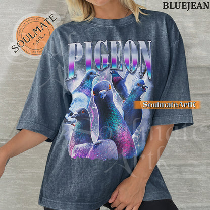 Collage of several pigeons with iridescent feathers surrounded by purple lightning and clouds with bold gradient text reading PIGEON on a washed bluejean shirt.