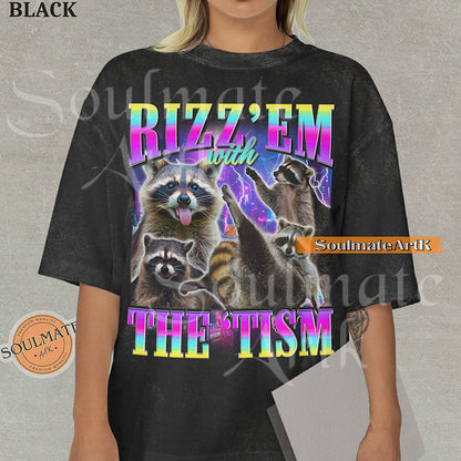 Graphic collage of multiple raccoons over a neon city with bold rainbow text reading RIZZ 'EM WITH THE 'TISM on a washed black shirt.