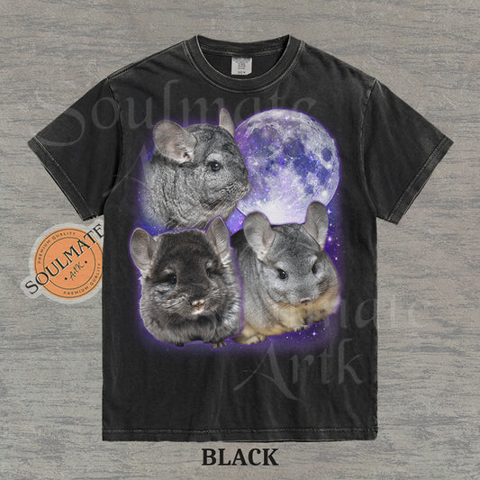 Collage of three grey chinchillas in front of a glowing purple moon and stars on a washed black shirt.