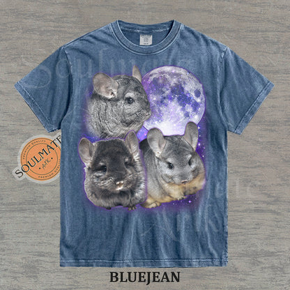 Collage of three grey chinchillas in front of a glowing purple moon and stars on a washed bluejean shirt.