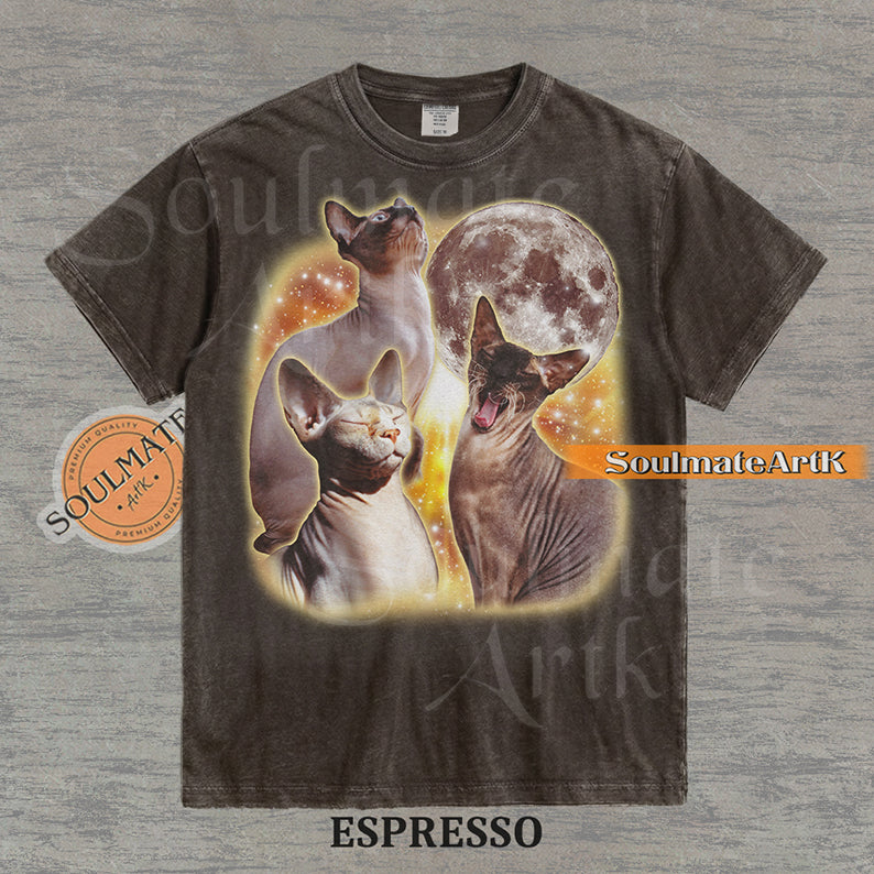 Collage of three Sphynx cats in front of a glowing moon and a golden starry nebula on a washed espresso shirt.