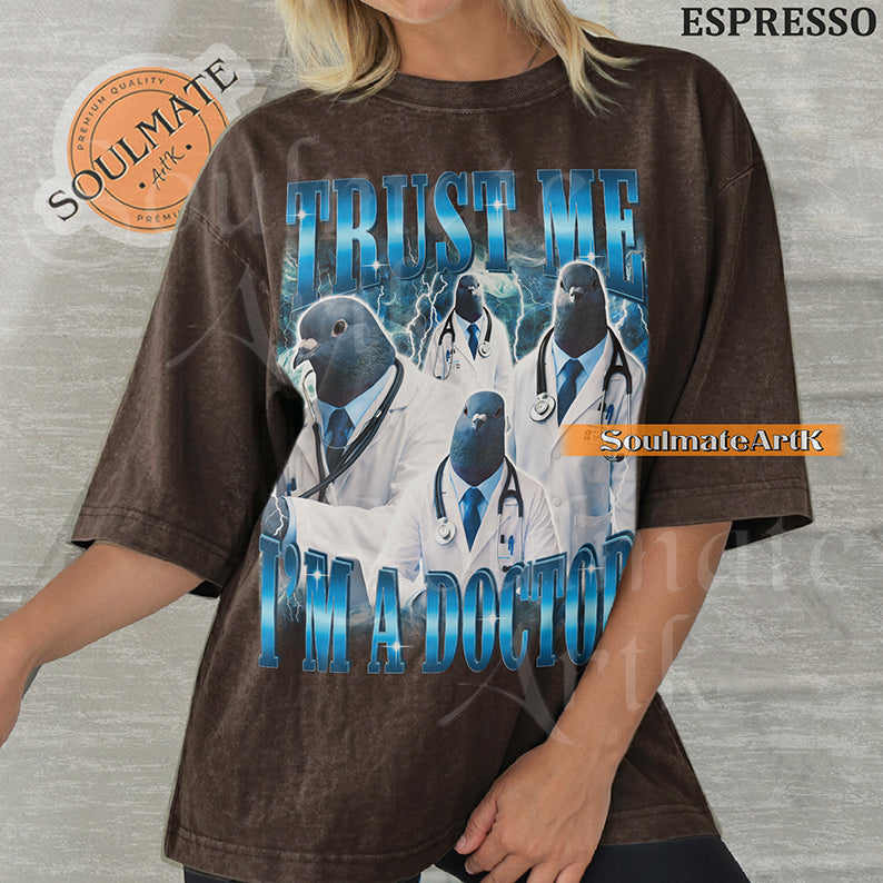Collage of pigeons in doctor coats and stethoscopes with blue lightning and bold blue text reading Trust Me I'm A Doctor on a washed espresso shirt.
