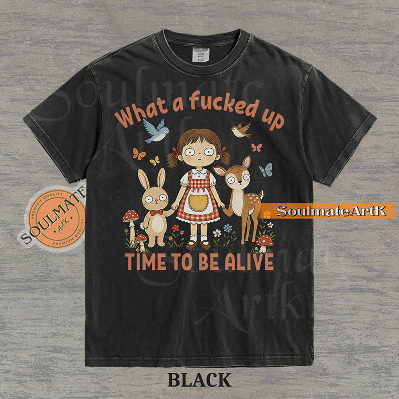 Illustration of a startled girl with a bunny and deer in a forest with the text "What a fucked up TIME TO BE ALIVE" on a washed black t-shirt.