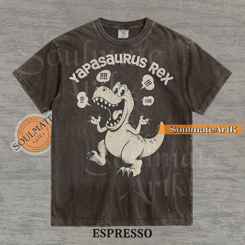 A funny t-shirt featuring a T-Rex dinosaur with the text "Yapasaurus Rex." A hilarious meme graphic for people who talk too much, in a vintage-style illustration.